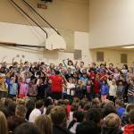 Ms. Cuddihys fourth grade class sing patriotic songs at Snoqualmie Elementarys Veterans Day assembly. Madison Miller/staff photo.