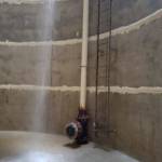 Sallal employees are flush and clean the water tank as they test for hazardous materials and coliform bacteria. Photo courtesy of Sallal Water Association