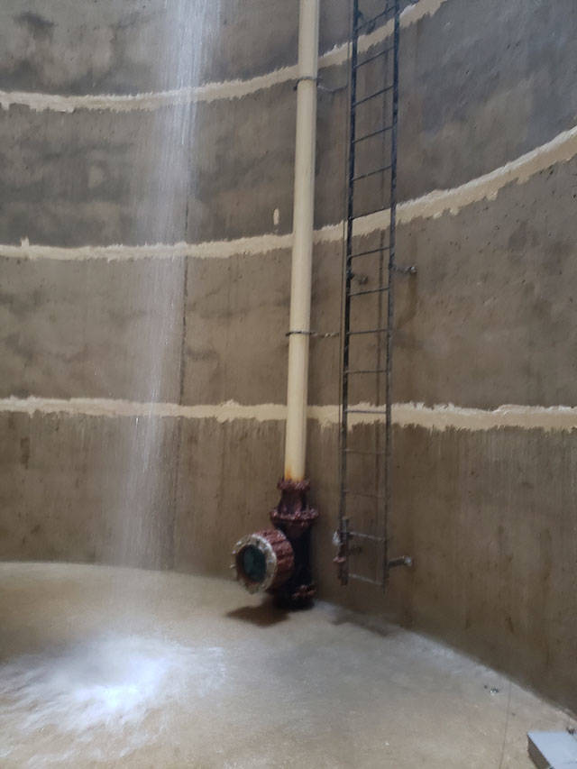Sallal employees are flush and clean the water tank as they test for hazardous materials and coliform bacteria. Photo courtesy of Sallal Water Association