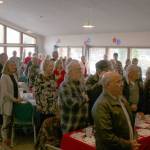 The crowd signs the national anthem at Mount Si Senior Centers annual Veterans Day lunch. Evan Pappas/Staff Photo