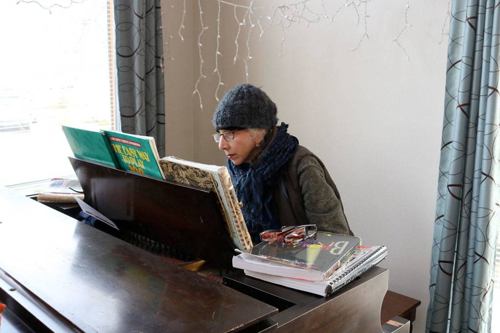 Carol Mukhalian played the national anthem as the luncheons guest sang the lyrics. Evan Pappas/Staff Photo