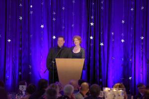 Mark and April Bennett sharing their story with the audience. Photo courtesy of Erik Alston Photography.
