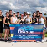 Front, left to right: Michele Lalime, Pat Tuton, Kitty Hubbard, Zhe Li, Shawn Thornsberry, Tracy Qi and Calvin Vu; back, left to right: Zheng Mu, Shu Shen, Daniel Chua, Rajesh Singh and Jeetu Thakur. The team designed its own gold logo, complete with the Space Needle, Mount Rainier, the Columbia Center and Smith Tower. Courtesy photo