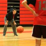 Head coach Jason Griffith eyes the scene at a recent practice. Andy Nystrom / staff photo