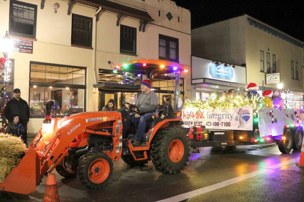 Festive tractor rides around town were offered for free throughout the evening. Evan Pappas/Staff Photo