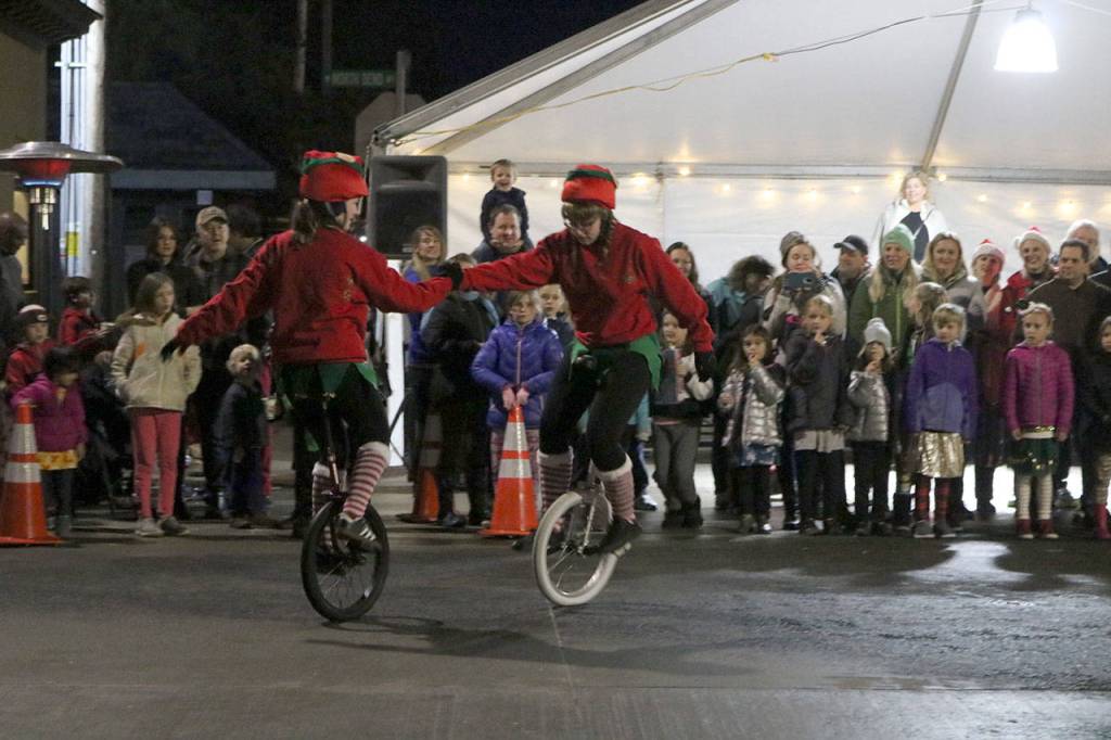 The Snoqualmie Valley Unicycle Club performed at the North Bend Holly Days event. Evan Pappas/Staff Photo