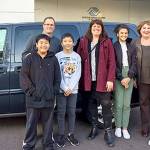 The Boys and Girls Clubs of Bellevue also received a van from King County. BGCB President/CDO Ryan Scott, BGCB President/CEO Kathy Haggart, and members of the club receive van from Councilmember Claudia Balducci. Courtesy of King County.