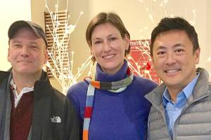 From left, director of local services John Taylor welcomes Danielle de Clercq as deputy director and Jim Chan as director of the permitting division. Photo courtesy of King County Local Services