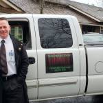 David Israel commits to his guided tours by getting into costume and playing music from Twin Peaks for those on his tour (Drew Stuart/Staff Photo)