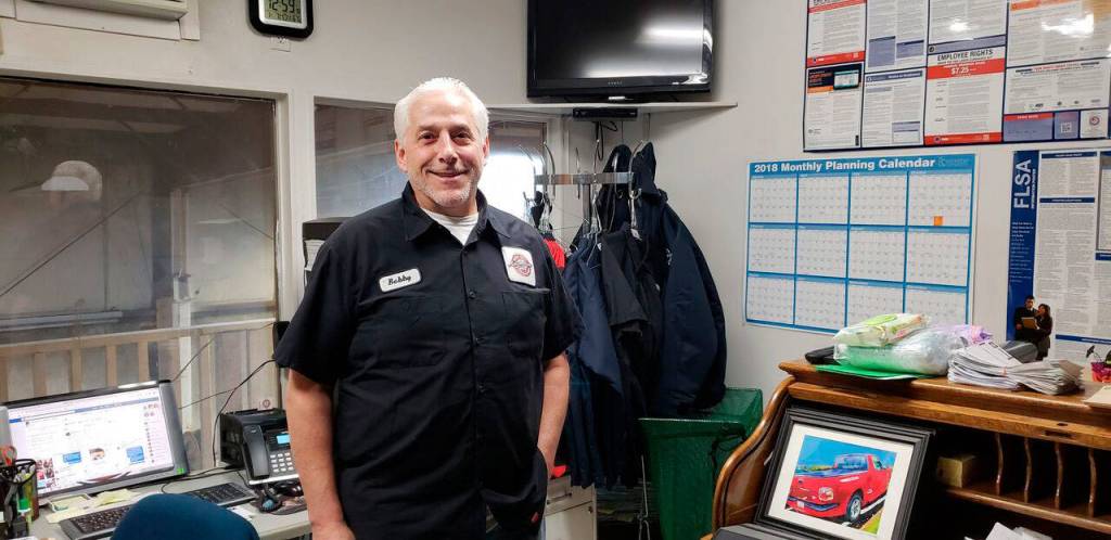 Owner of North Bend Automotive Bobby Farris stands in his office, though he prefers to work on the floor of his auto shop. Drew Stuart/Staff Photo