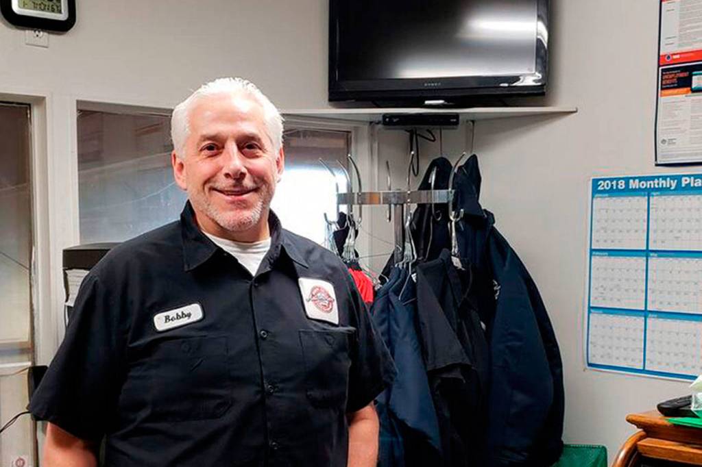 Owner of North Bend Automotive Bobby Farris stands in his office, though he prefers to work on the floor of his auto shop. Drew Stuart/Staff Photo