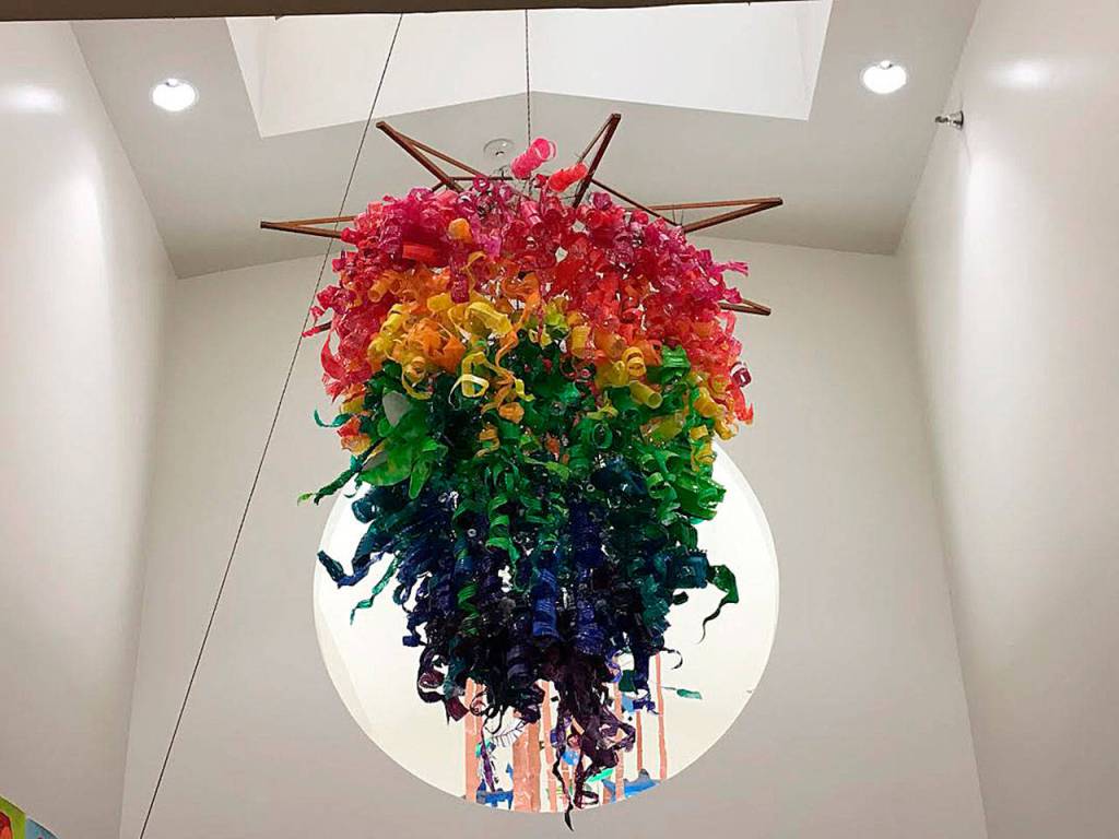 The completed chandelier hangs in the entry hallway of Chief Kanim Middle School. Photo courtesy of Julie Lagace