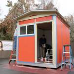 Volunteers in Issaquah finish a tiny house last December before donating it to the Low Income Housing Institutes newest village for homeless residents in Olympia. The 8-foot by 12-foot house featured insulation, electricity, heat, windows, and a lockable door. Evan Pappas/Staff photo