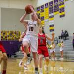 Mount Si Wildcats junior guard Carly Britton, right, tries to chase down Issaquah senior Luci Stewart, center, in a matchup between rivals on Jan. 25 in Issaquah. Issaquah defeated Mount Si 55-23. Photo courtesy of Don Borin/Stop Action Photography