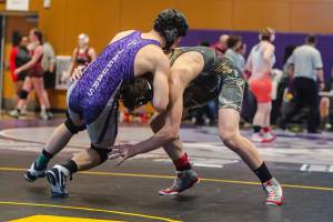 Mount Si 170-pound wrestler Sage Phelps, right, pictured wrestling against North Creeks Matt Kendrick in the finals, earned second place in his weight class at the 4A KingCo wrestling tournament on Feb. 2 at North Creek High School. Photo courtesy of Don Borin/Stop Action Photography
