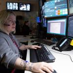 Beginning her Tuesday shift, Issaquah dispatcher Felicia Moore begins taking phone calls. Ashley Hiruko/staff photo