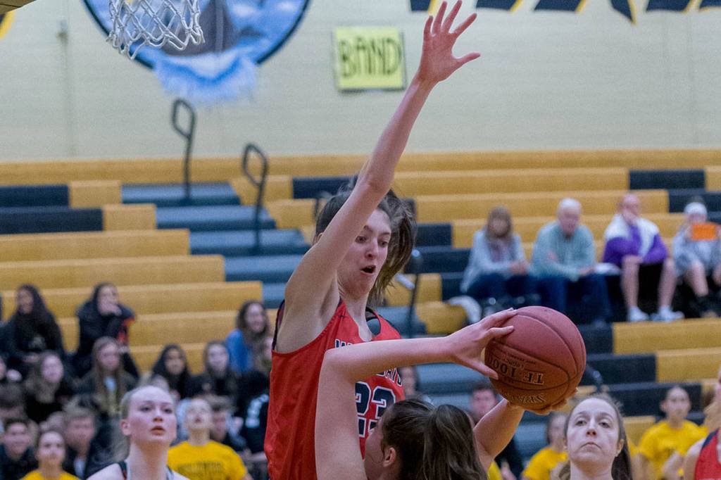 Inglemoor junior Cecelia Bresee, right, is defended proficiently by Mount Si freshman forward Lauren Glazier, left, during a Wes-King 4A district playoff game on Feb. 7 at Inglemoor High School in Kenmore. Photo courtesy of Patrick Krohn/Patrick Krohn Photography