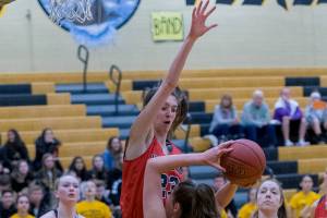 Inglemoor junior Cecelia Bresee, right, is defended proficiently by Mount Si freshman forward Lauren Glazier, left, during a Wes-King 4A district playoff game on Feb. 7 at Inglemoor High School in Kenmore. Photo courtesy of Patrick Krohn/Patrick Krohn Photography