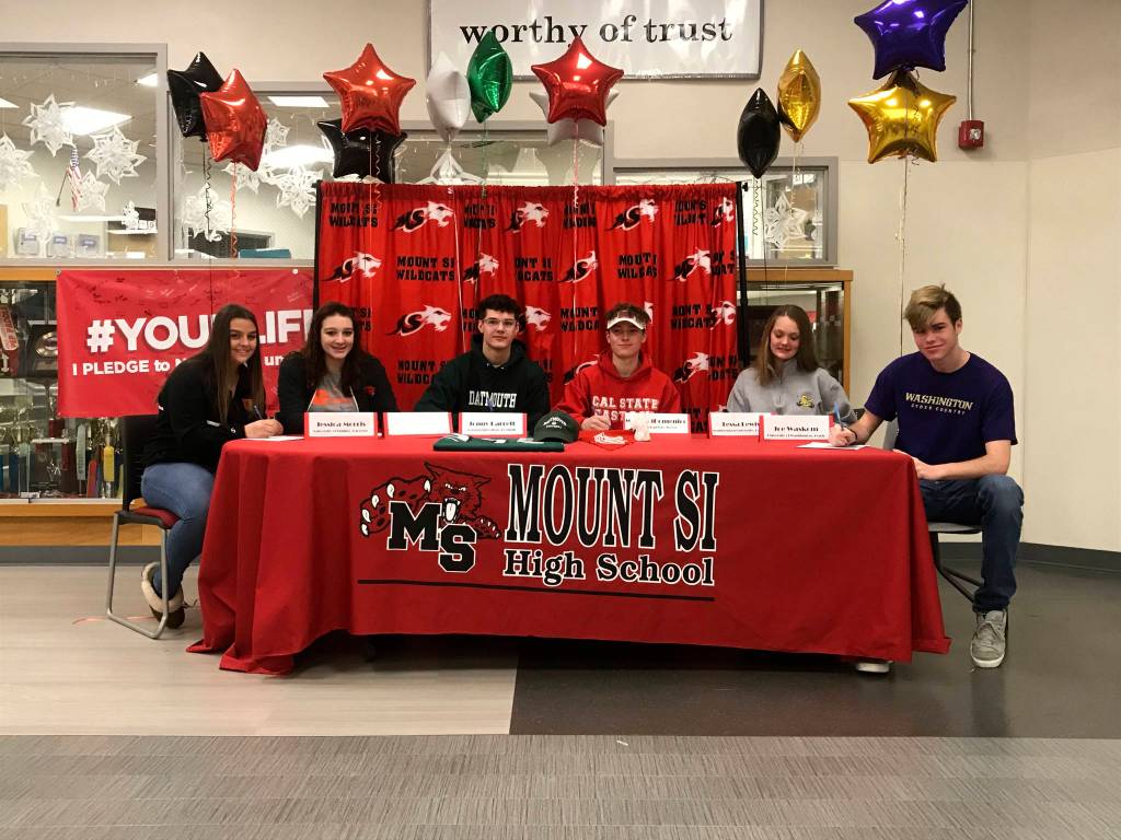 Six Mount Si High School Wildcats student athletes made their collegiate athletic choices known to the entire North Bend/Snoqualmie community during a signing-day ceremony on the morning of Feb. 7 at Mount Si High School. Mount Si athletes moving on to the collegiate level in their respective sports consisted of Hayley West (Oregon State University-rowing), Jonny Barrett (Dartmouth-football), Tessa Lewis (Southwestern University-lacrosse), Jessica Morris (University of Findlay-lacrosse), Mateo DiDomenico (Cal State East Bay-soccer) and Joe Waskom (University of Washington-track). Photo courtesy of Darren Brown