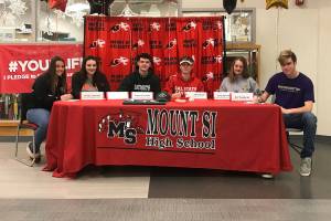 Six Mount Si High School Wildcats student athletes made their collegiate athletic choices known to the entire North Bend/Snoqualmie community during a signing-day ceremony on the morning of Feb. 7 at Mount Si High School. Mount Si athletes moving on to the collegiate level in their respective sports consisted of Hayley West (Oregon State University-rowing), Jonny Barrett (Dartmouth-football), Tessa Lewis (Southwestern University-lacrosse), Jessica Morris (University of Findlay-lacrosse), Mateo DiDomenico (Cal State East Bay-soccer) and Joe Waskom (University of Washington-track). Photo courtesy of Darren Brown