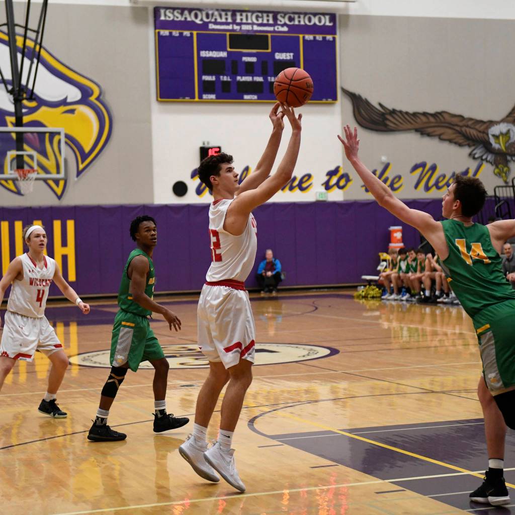 Mount Si Wildcats senior Jonny Barrett, who will play football at Darmouth next fall, made several key baskets in the regional playoff game against the Richland Bombers. Barrett finished the game with 13 points. Photo courtesy of Calder Productions