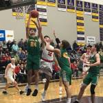 Mount Si senior Jonny Barrett (No. 32) battles for position in the paint as Richland senior Colten Northrop corrals a rebound in a regional playoff game on Feb. 23 at Issaquah High School. Mount Si defeated Richland 60-54. Shaun Scott, staff photo