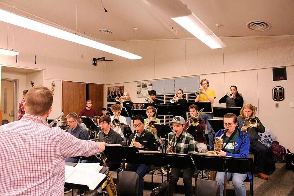 Bill Leather and the jazz band rehearse Groove Merchant for the upcoming Essentially Ellington competition. Madison Miller/staff photo