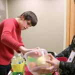 Paige Bisbees day at the law firm starts off by loading up her cart with snacks and office supplies. Stephanie Quiroz/staff photo.