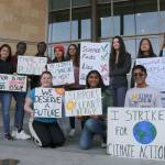 Redmond students gather outside city hall to discuss city environmental policy with the administration. From left, back row: Stephanie Osorio-Tristan, Sara Mou, Ester Girr, Trisha Beher, Bharathi Vaidhyanathan, Faye Thijssen, Sawako Tsukada, and Phoebe Jenkins. From left, front row: Evelyn Briggs, Meghna Shankar, and Arpit Ranasaria. Evan Pappas/Staff Photo