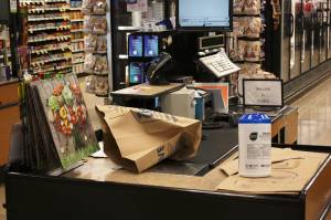 The Factoria QFC (pictured here) was part of the phase out pilot last November that included five other locations in the area. Currently, the stores only have paper bags and offer reusable bags for purchase at the checkout aisles. Kailan Manandic / staff photo