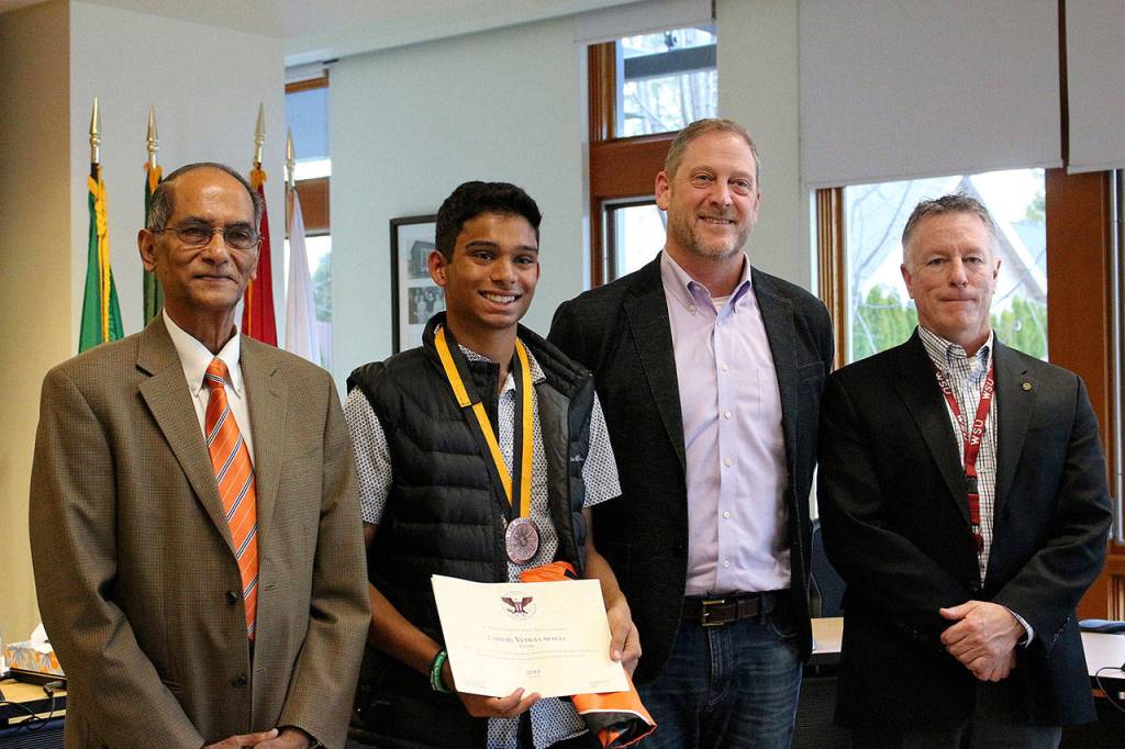 Vedullapalli was recently named a distinguished finalist in the Prudential Spirit of Community awards. From left: Abraham Mathan, Chirag Vedullapalli, MSHS principal Jim Belcher, SVSD superintendent Robert Manahan. Madison Miller / staff photo