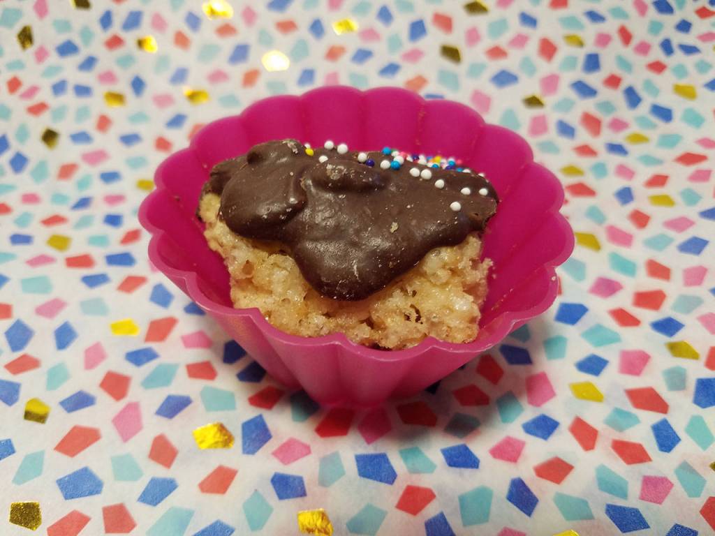 While Sweet Treats focuses on cookie dough, the storefront also offers a variety of treats, such as this krispy treat topped with cookie dough, chocolate and sprinkles. Courtesy photo