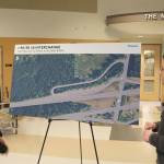 A WSDOT team member explains how the westbound interim auxiliary ramp will work to route traffic from the SNoqualmie Parkway on to I-90. Evan Pappas/Staff Photo