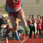 Mount Si senior Tatum Dalgleish flies through the triple jump. Andy Nystrom / staff photo