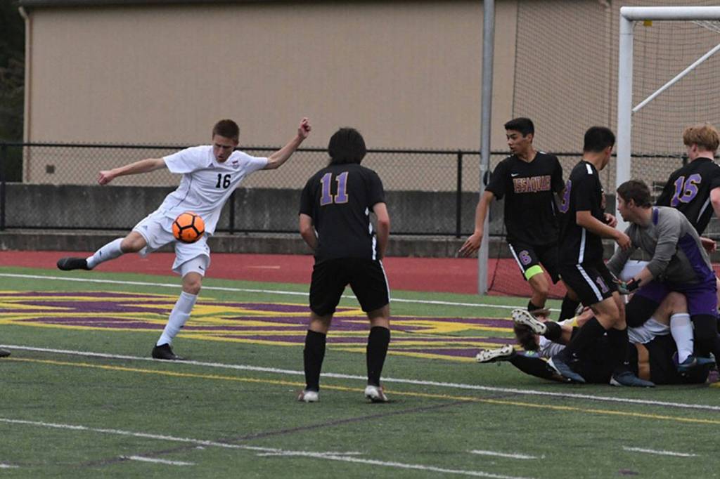 Mount Si sophomore Sully Smith (No. 16) scores a goal in the 39th minute, giving Mount Si a 2-0 lead against the Issaquah Eagles. Mount Si defeated Issaquah, 3-2, in the 4A state quarterfinals on May 18 at Gary Moore Stadium in Issaquah. Photo courtesy of Calder Productions