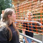 Salisbury, 19, of Redmond helps Hyatt train Nova.