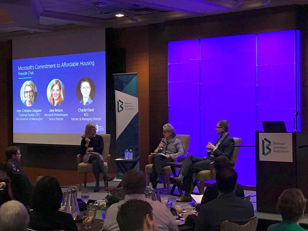 Kailan Manandic / staff photo                                (From left) Jane Broom, Microsoft Philanthropies senior director, former Washington Gov. Christine Gregoire, who now serves as CEO of Challenge Seattle, and Charlie Davis, partner and managing director at the Boston Consulting Group, speak on Microsofts $500 million commitment to affordable housing at a panel discussion during a Bellevue Downtown Association breakfast.