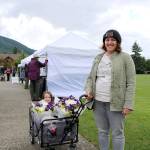 Nicole Tougher and daughter Sophia, 3, of Snoqualmie at the North Bend Farmers Market opening day on June 6.