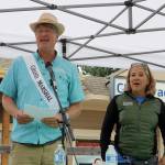 Pete and Judy Nelson, grand marshals of the event, announce the winners of the parade awards. Evan Pappas/Staff Photo
