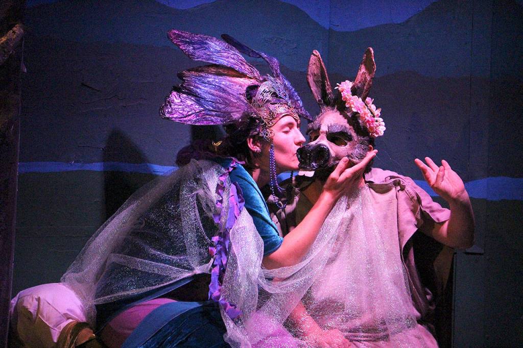 Kathryn Stahl (Titania) and Michael Murdock (Bottom) rehearse their scene for A Midsummer Nights Dream that open June 14. Madison Miller / staff photo