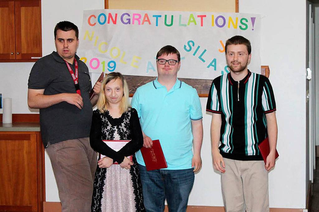 Snoqualmie Valley School Districts Transition Learning Center (TLC) graduated four students: Axel Smith, Nicole Yancey, Silas Palmisano and Jon Isitt. Photo courtesy of SVSD