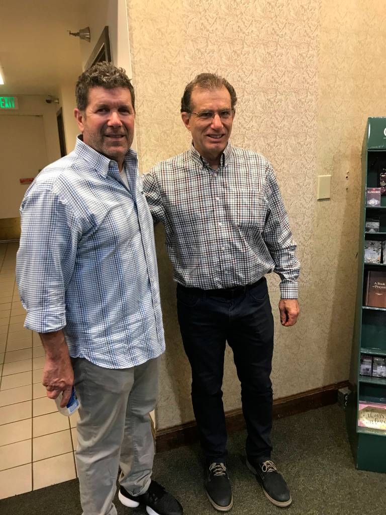 Seattle Mariners legend Edgar Martinez, left, and Seattle Times Columnist Larry Stone, right, collaborated on a book titled, Edgar: An Autobiography. Martinez and Stone attended a book signing on June 12 at Barnes Noble in Bellevue. Shaun Scott/staff photo