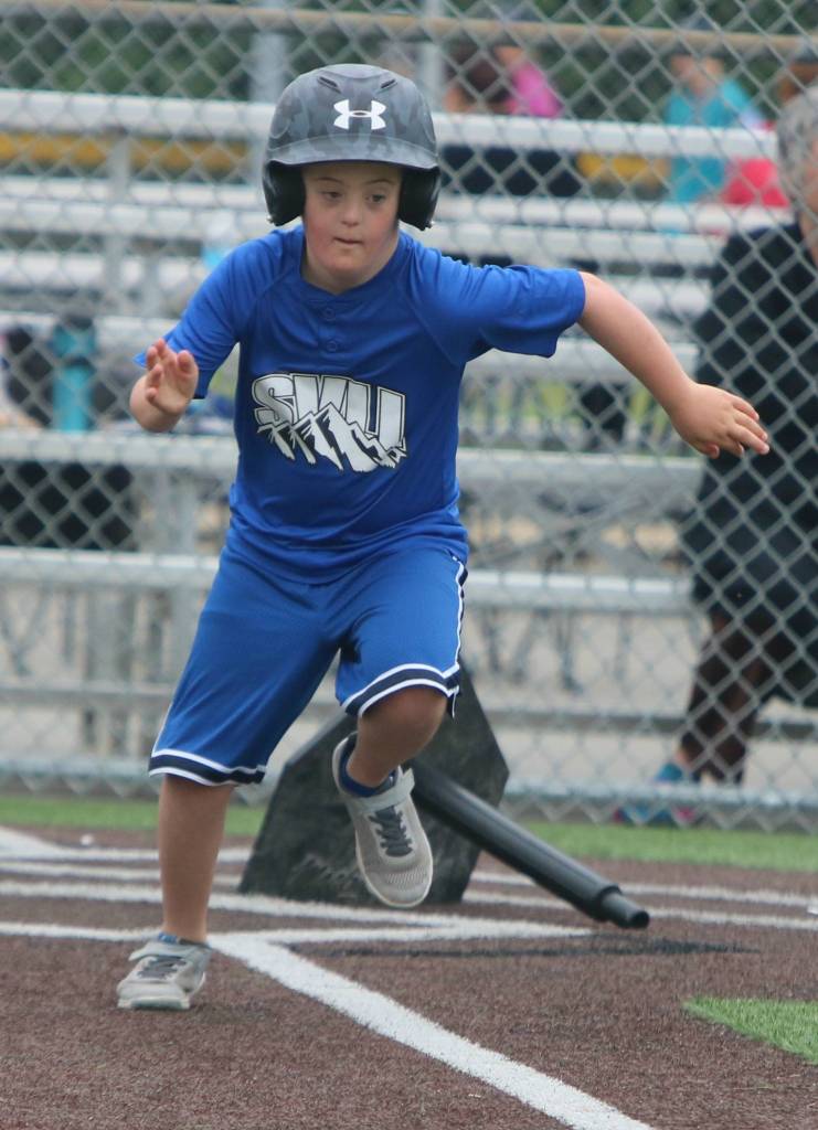 Team Snoqualmies Aidan Duffy runs to first base after knocking a hit. Andy Nystrom / staff photo
