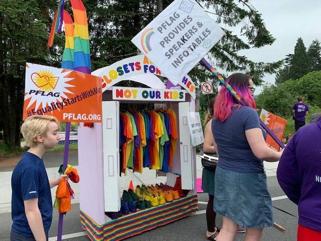 Photo courtesy of Beth Lenholt                                Members of PFLAG Bellevue Eastside march in this years Duvall Days parade earlier this month.