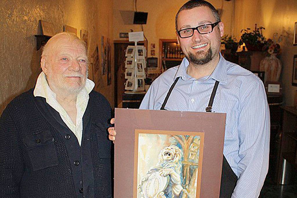 File photo                                Richard Burhans with Sinacia Yovanovich at the Euro Lounge Cafe and crepe restaurant in downtown North Bend.