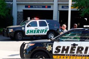 FILE PHOTO: King County Sheriffs Office deputies block off access to the Kent Station parking garage after a deputy shot and killed a suspect in a reportedly stolen Honda Civic in 2018.