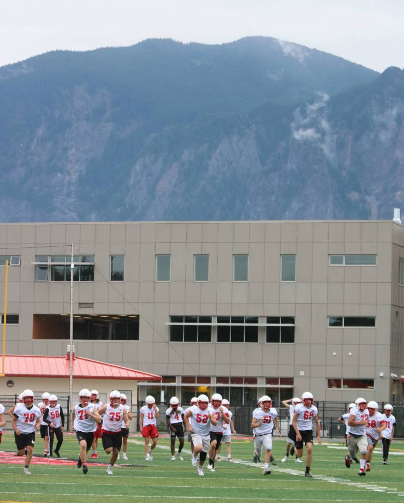 Mount Si players get in some running toward the end of the practice. Andy Nystrom/ staff photo