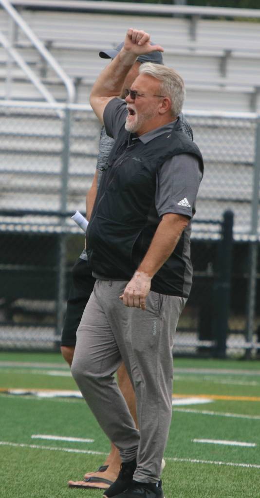 Head coach Charlie Kinnune instructs his players. Andy Nystrom/ staff photo