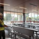 Photo by Madison Miller / staff photo                                SVSD assistant superintendent Ryan Stokes walks through one of the multiple commons areas in the new MSHS.