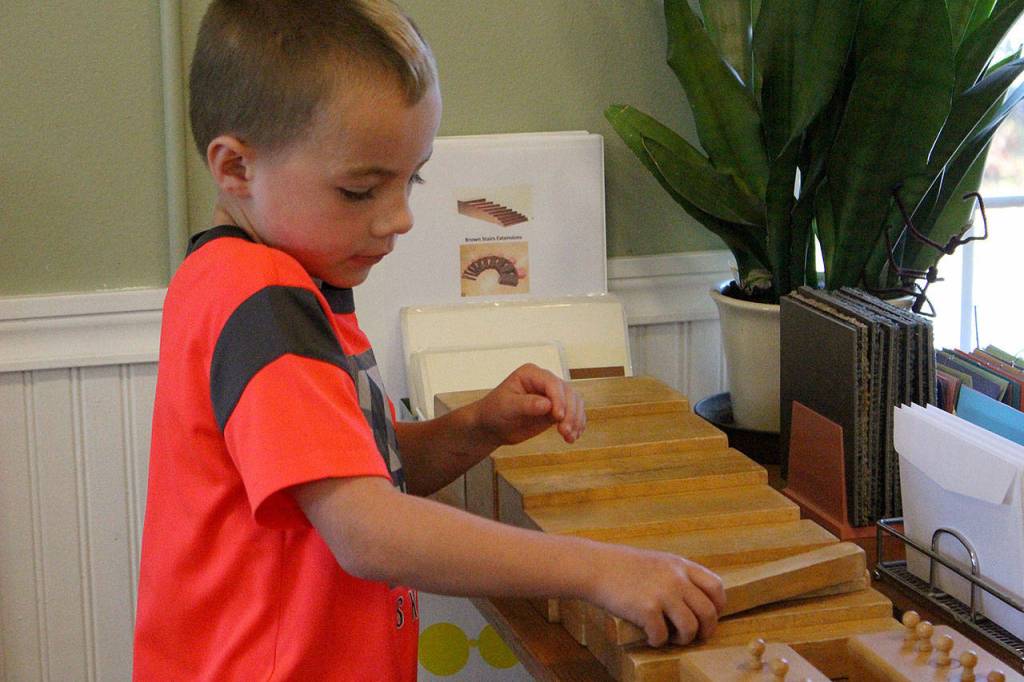 Garrett Lenihan, 7, plays with blocks at Mount Si Montessori.